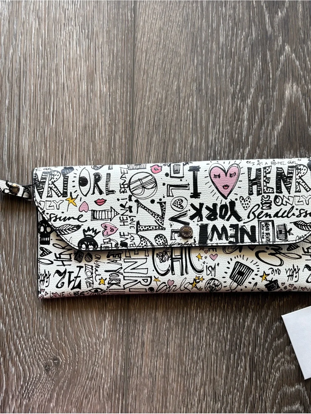 Henri Bendel White Graphic wristlet with Black and Pink Accents